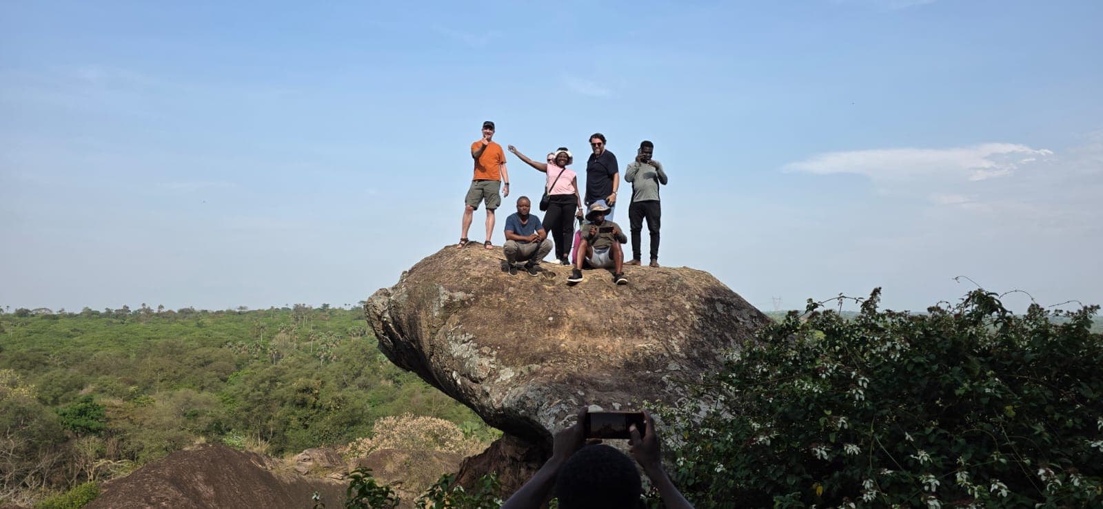 A Ucomeafrik group tour on a rock outcrop in Ghana